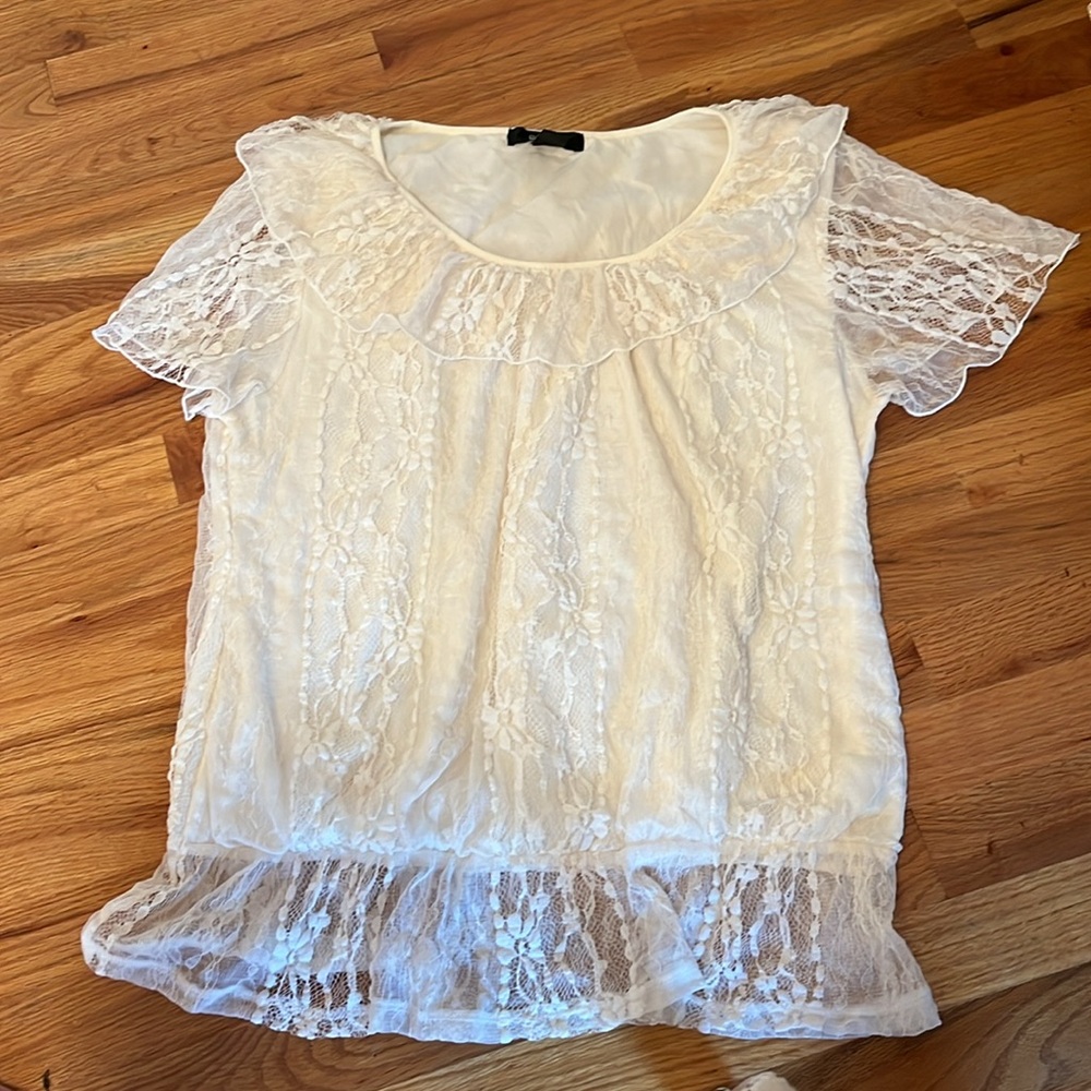 Beautiful off-white women’s shirt.